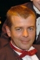 Адриан Холл